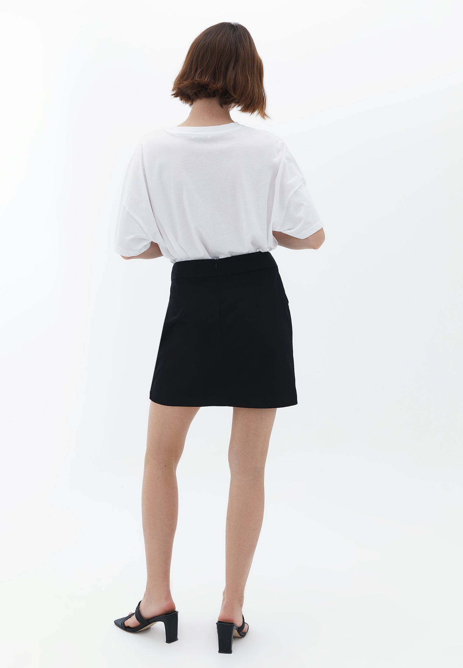 BUTTONED ASYMMETRIC MINI SKIRT - BLACK