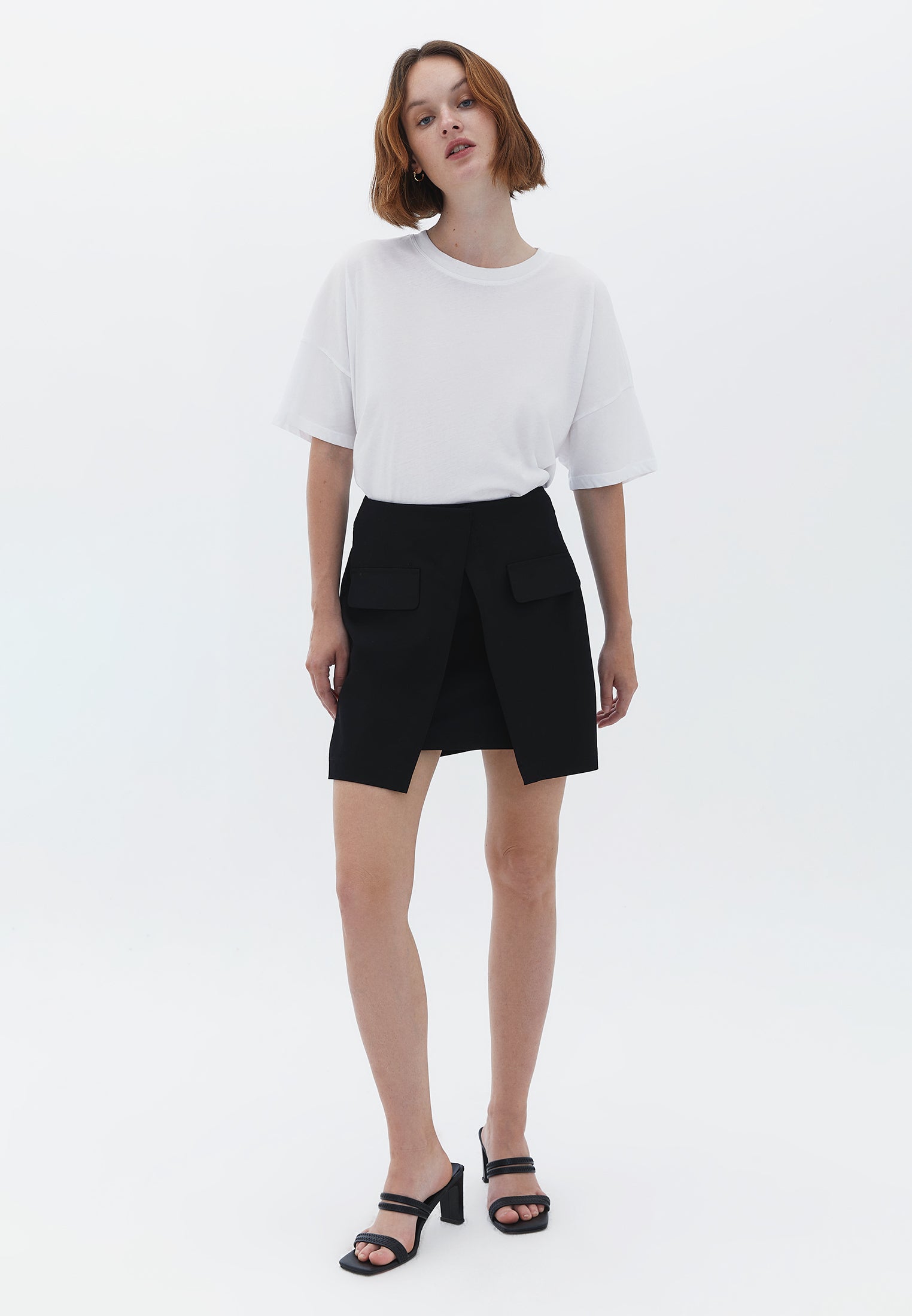 BUTTONED ASYMMETRIC MINI SKIRT - BLACK
