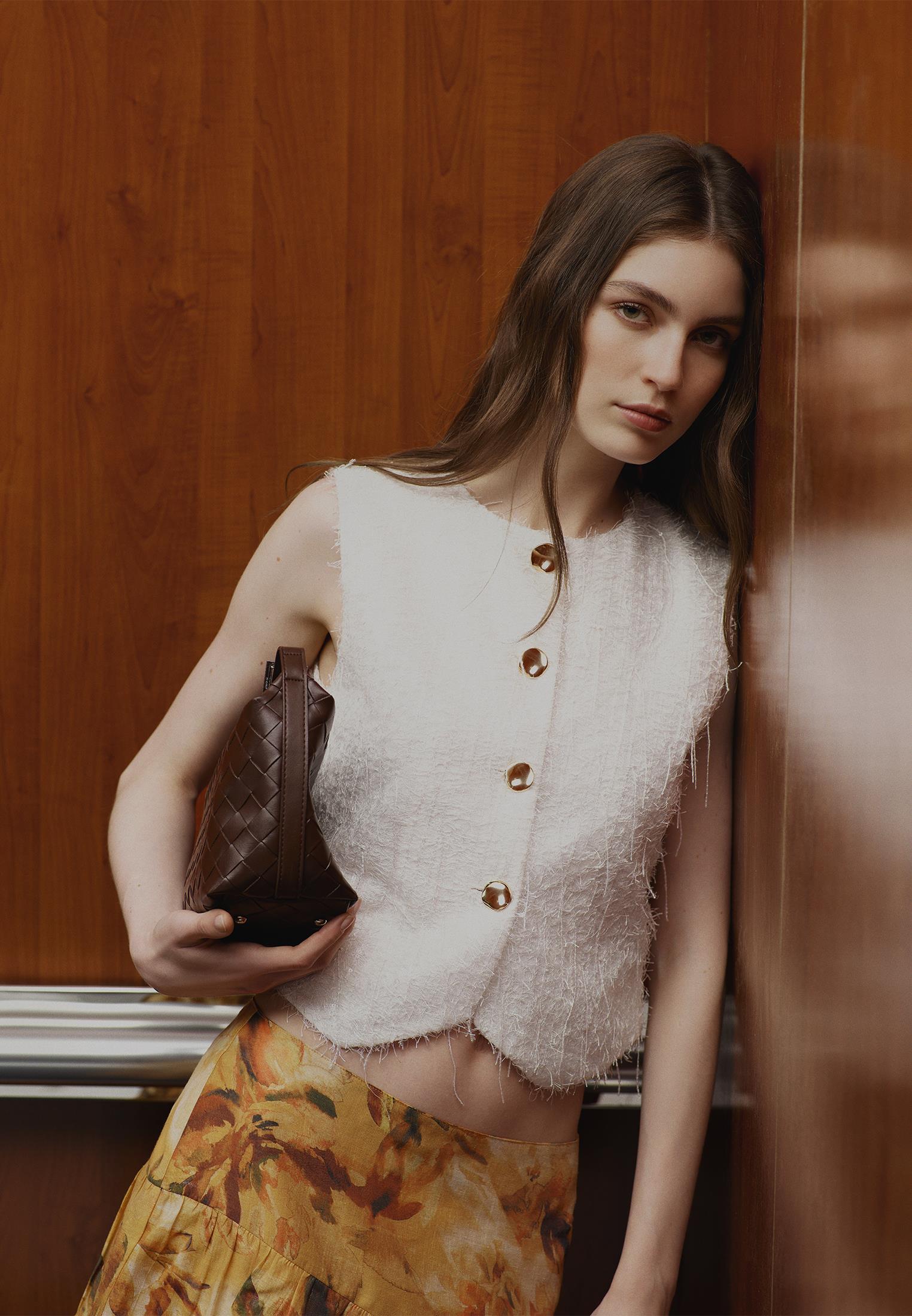 Sleeveless Vest With Button And Tassel Details - WHITE